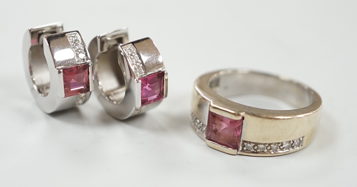 A modern 18ct white gold, pink tourmaline and diamond chip set suite of jewellery, comprising a ring, size O and pair of matching hoop earrings, 15mm, gross weight 16.8 grams.